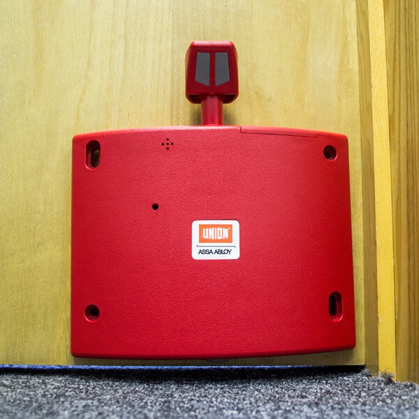 Union Wireless Fire Door Holder Red - In Situ